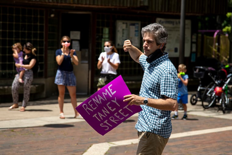 Ben Keys, protest organizer, speaks about the history of Taney Street in Fitler Square Saturday and why it should be renamed.