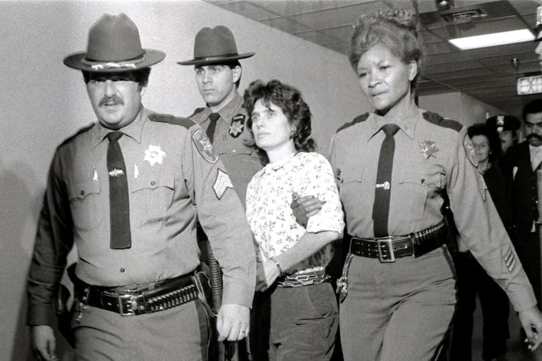 Weather Underground member Katherine Boudin is led from Rockland County Courthouse in New City, New York, by sheriff's officers on Nov. 21, 1981.