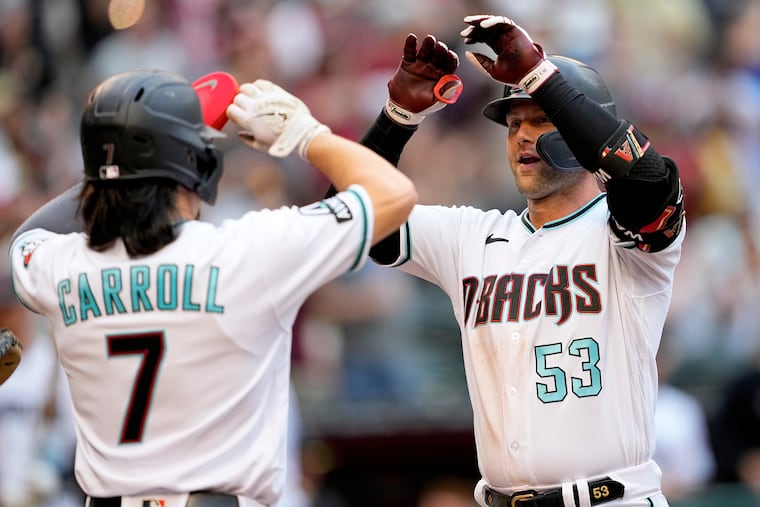 Norristown native Christian Walker (right) and presumptive NL Rookie of the Year Corbin Carroll power the Diamondbacks offense.