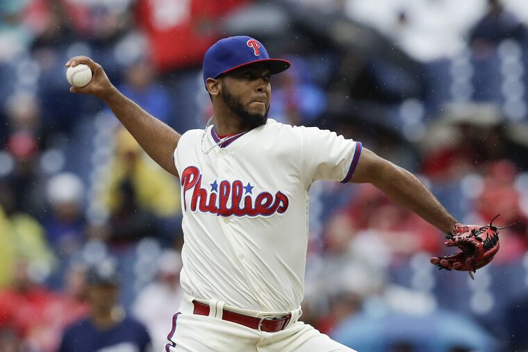 Reliever Seranthony Dominguez pitches against the Brewers on June 10.