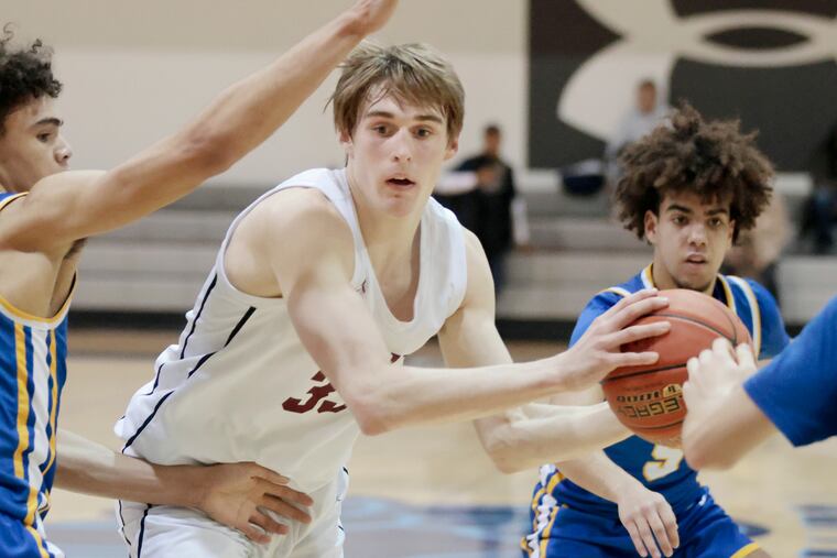 Radnor’s Jackson Hicke looks for an open teammate while playing Downingtown West during the Maggie Lucas Play-By-Play Classic at Thomas Jefferson University's Gallagher Center in Phila., Pa. on Sun., Jan. 22, 2023.