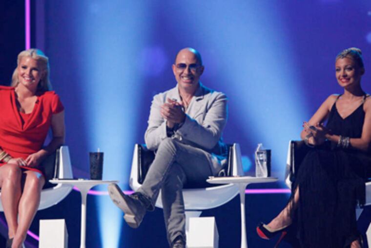 Jessica Simpson (left), John Varvatos (center) and Nicole Ritchie are "Fashion Star's" celeb judges. (Associated Press)