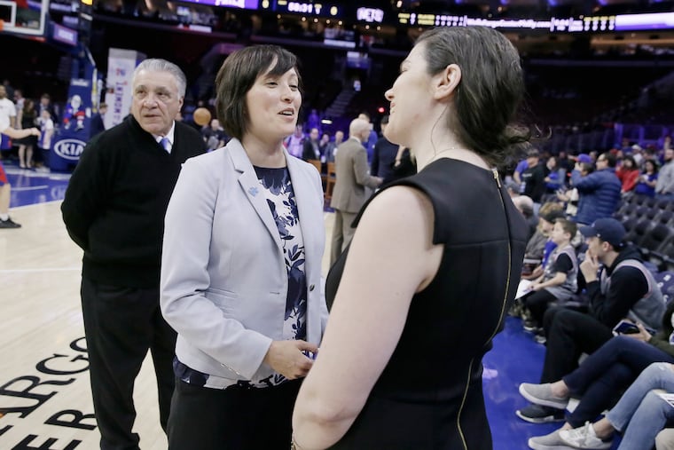 Sporst were a huge part of Amy Hever's (left) life growing up. Now, she's helping a pro sports franchise be better off the court. Talk about full circle.