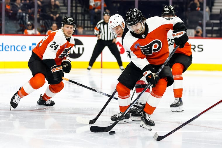 Flyers defenseman Jamie Drysdale keeps his eye on the puck against the New Jersey Devils on March 9.