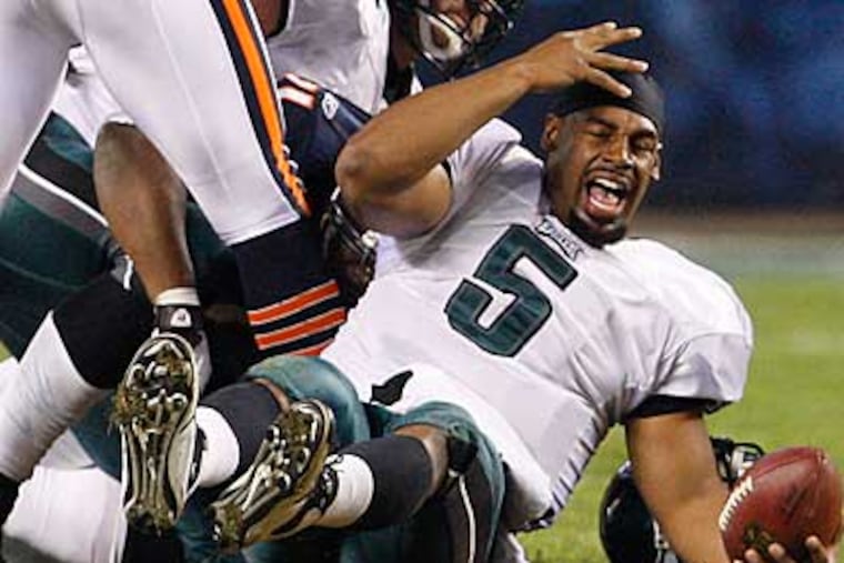 The Eagles inconsistent offensive line is only part of the reason Donovan McNabb has found himself on the turf more often than usual this season, according to offensive coordinator Marty Morningweg. (Ron Cortes/Staff Photographer)