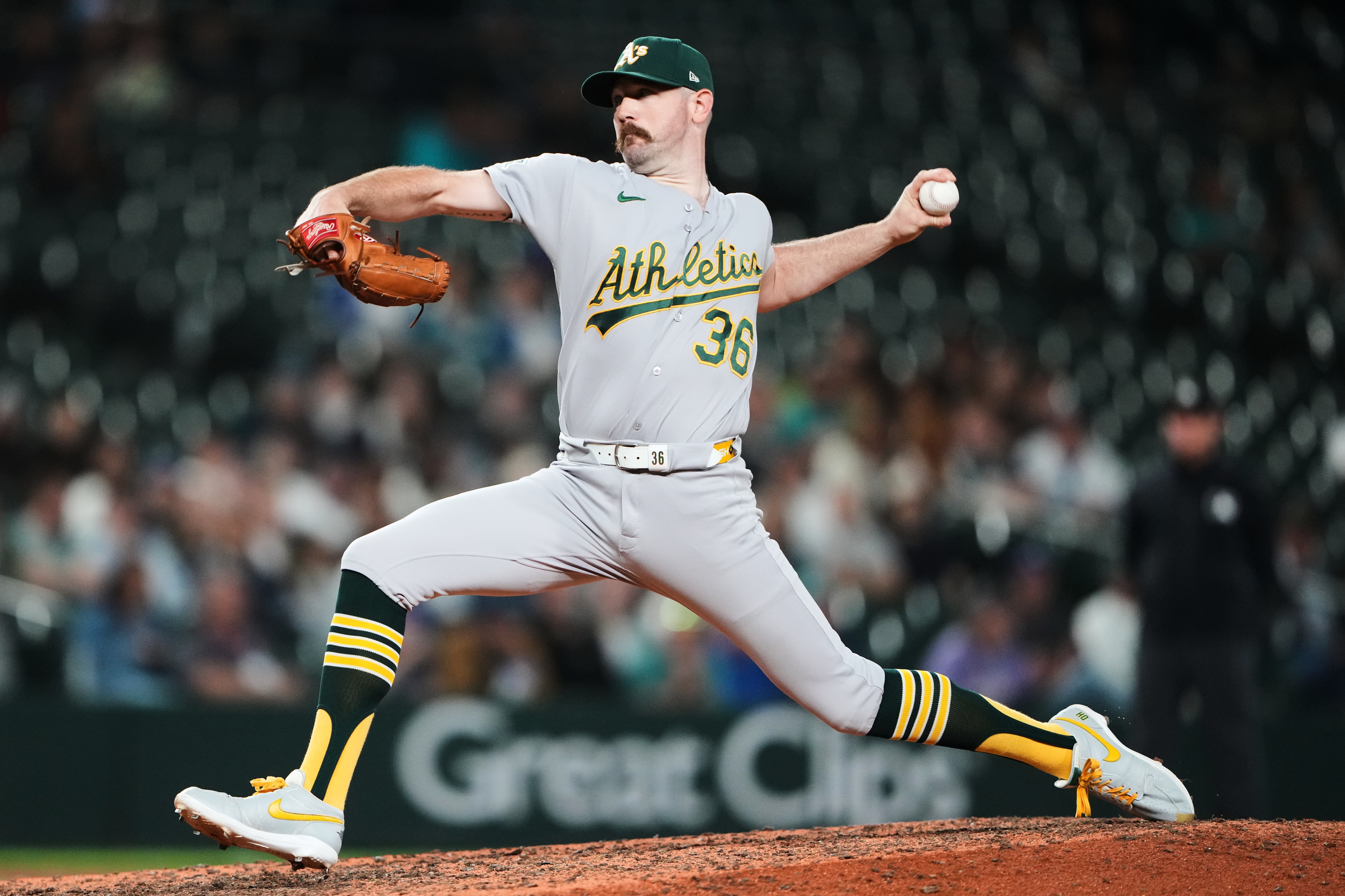Butler drives in go-ahead run, A's pitchers combine for 18 strikeouts in 7-4 win over Mariners