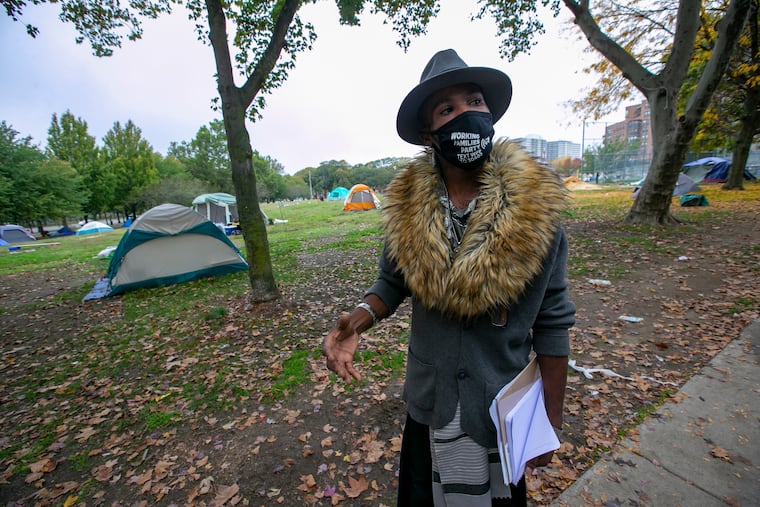Jeremy Williams, activist, minister, and resident of the homeless encampment on the Benjamin Franklin Parkway. He said that before the houses promised by the city are available to people leaving the encampment, they must find temporary places to live.