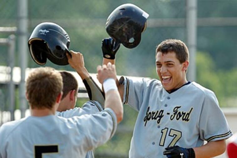 Spring-Ford's Mike Oczypok celebrates his two-run home run in the fourth inning. (Ron Cortes/Staff Photographer)
