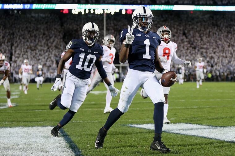 K.J. Hamler celebrates a second-quarter touchdown during Saturday's Penn State loss.