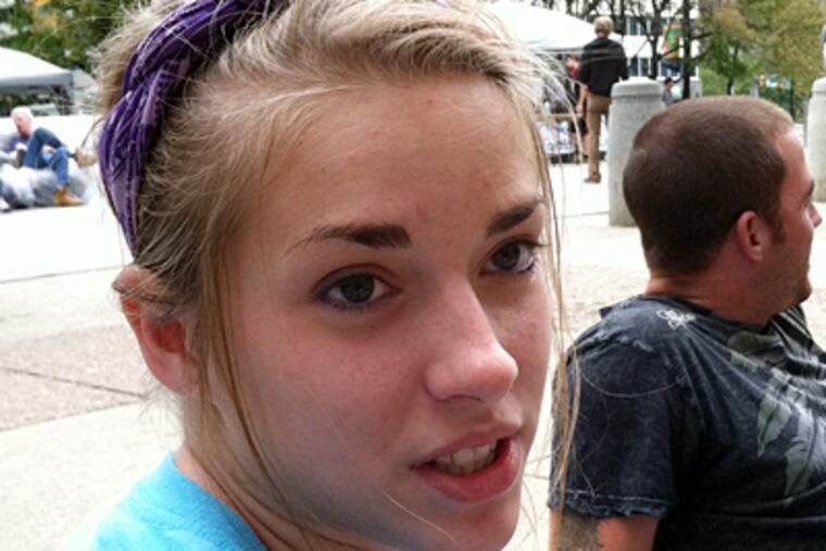 "It was a very saddening experience to have a stranger tell me that I can't live in my home," said Chelsea Hines, 18, of Drexel Hill. "I walk by it every day. There's a padlock on the door and nobody lives there." (Jane M. Von Bergen / Staff)