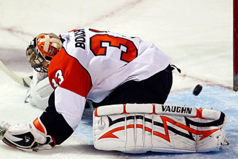 Brian Boucher gave up three goals and saved only 10 shots in the Flyers' loss to the Canadiens. (Paul Chiasson/Canadian Press/AP)