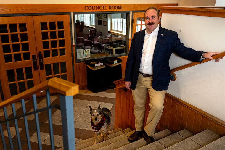 Mayor Conlen Booth with his dog Huckleberry at Swarthmore Borough Hall Sunday Jan. 18, 2026.