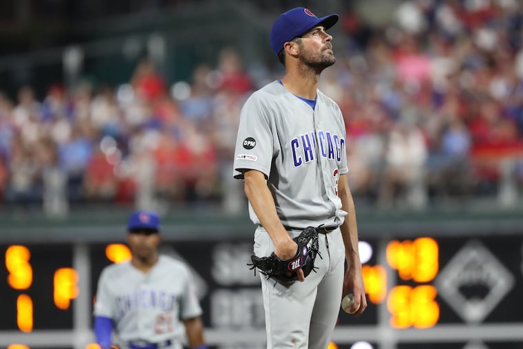 Cole Hamels of the Cubs reacts as he realizes Cubs Manager Joe Maddon is pulling him from the game against the Phillies at Citizens Bank Park on Aug. 14, 2019.