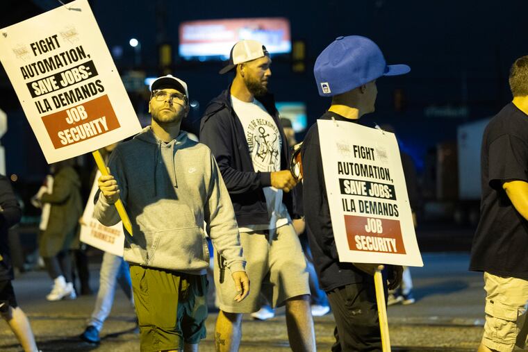 Striking Philadelphia longshoreman picket outside the Packer Avenue Marine Terminal Port on Tuesday, Oct. 1, 2024.