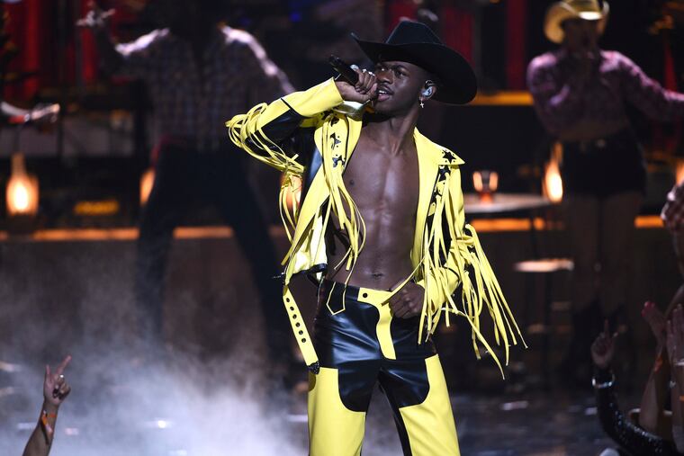 Lil Nas X performs "Old Town Road" at the BET Awards on Sunday, June 23, 2019, at the Microsoft Theater in Los Angeles. (Photo by Chris Pizzello/Invision/AP)