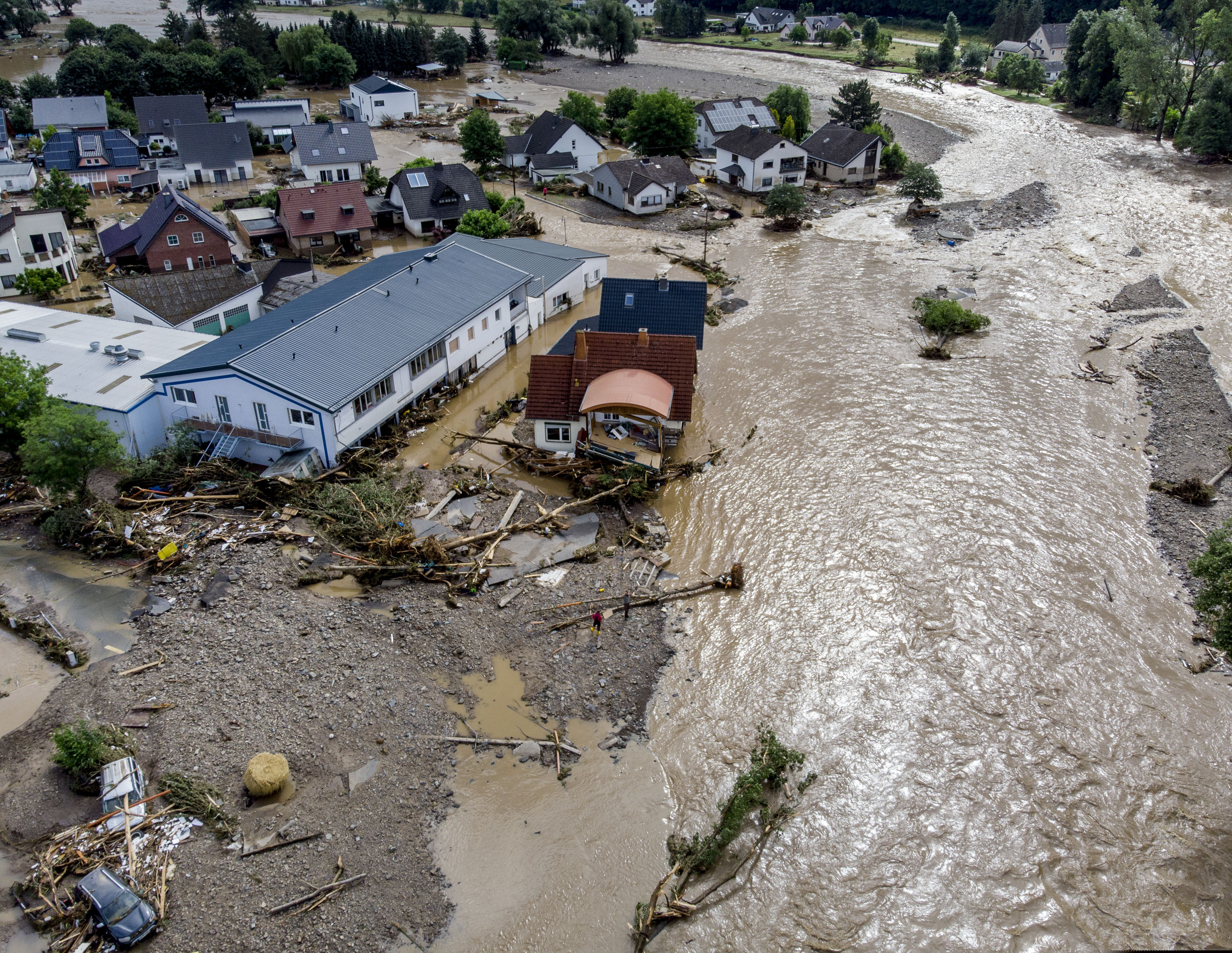 Damaged houses are seen at the Ahr river in Insul, western Germany, on Thursday.