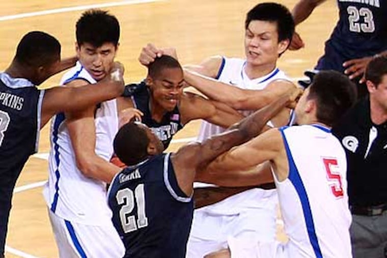 Georgetown and China's Bayi Rockets fought during an exhibition game in Beijing on Thursday. (AP Photo)