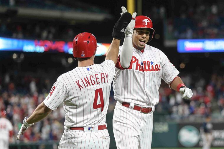 Pinch hitting for Phillies' pitcher Nick Pivetta, Aaron Altherr celebrates his two run home against the Braves with Scott Kingery who he brought in during the 7th inning at Citizens Bank Park in Philadelphia, Monday, May 21, 2018. Phillies shutout the Braves 3-0. STEVEN M. FALK / Staff Photographer