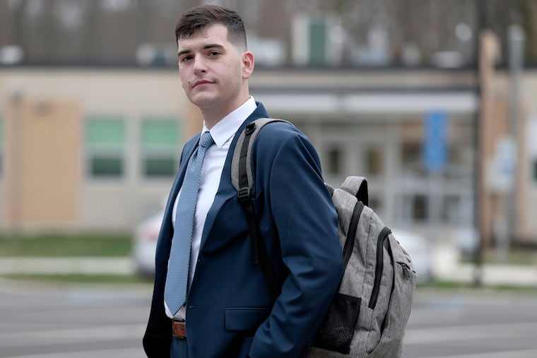 Journalist Ben Shore in front of the Cherry Hill Public Schools Board of Education headquarters.