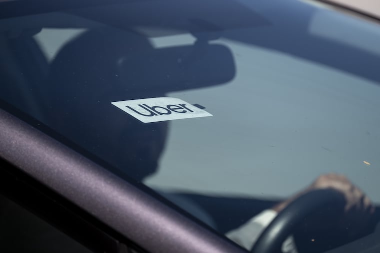 Uber signage on a vehicle in 2024.