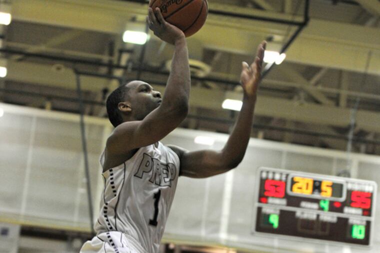St. Joe's Prep's Chris Clover shoots in the final seconds of the fourth period. ( TOM GRALISH / Staff Photographer )