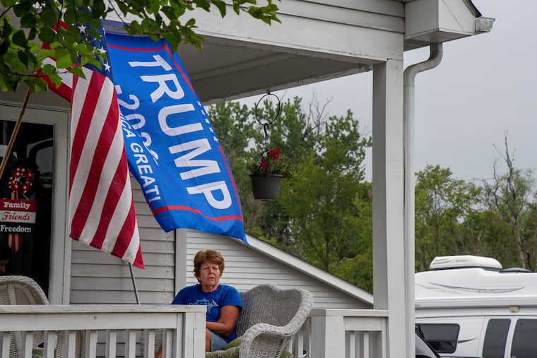 Ann Misselli on the front porch of her original Norvelt home.