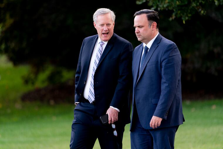 Former White House social media director Dan Scavino, right, and former White House chief of staff Mark Meadows.