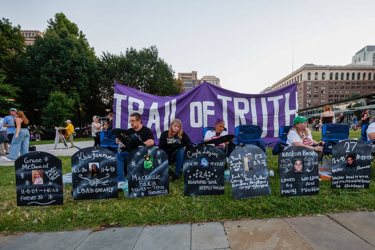 Makeshift tombstones are part of a “national cemetery” commemorating people who lost their lives to substance abuse-related causes. The memorial was set up across the street from the National Constitution Center ahead of Tuesday's presidential debate.