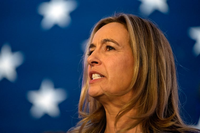 New Jersey Gov. Mikie Sherrill, pictured on election night in November, blamed her predecessor for noncitizens who were registered to vote in New Jersey and vowed to fix the problem.