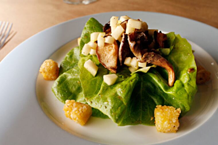 For a winter salad, hydroponically grown butterhead lettuce fills the bill, with cornmeal croutons tossed in apple cider vinaigrette. (Laurence Kesterson / Staff Photographer)