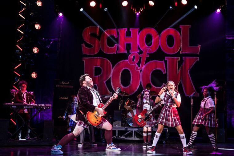 Rob Colletti (left center) and the cast of “School of Rock,” through April 1 at the Academy of Music.