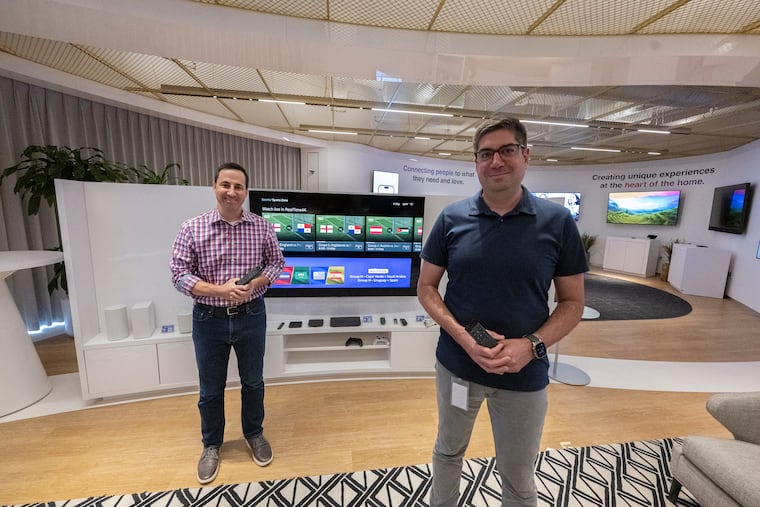 Comcast vice president of sports entertainment Vito Forlenza (left) and vice president of engineering and Joe Krell displayed technologies designed to enhance sports fans' viewing experience.