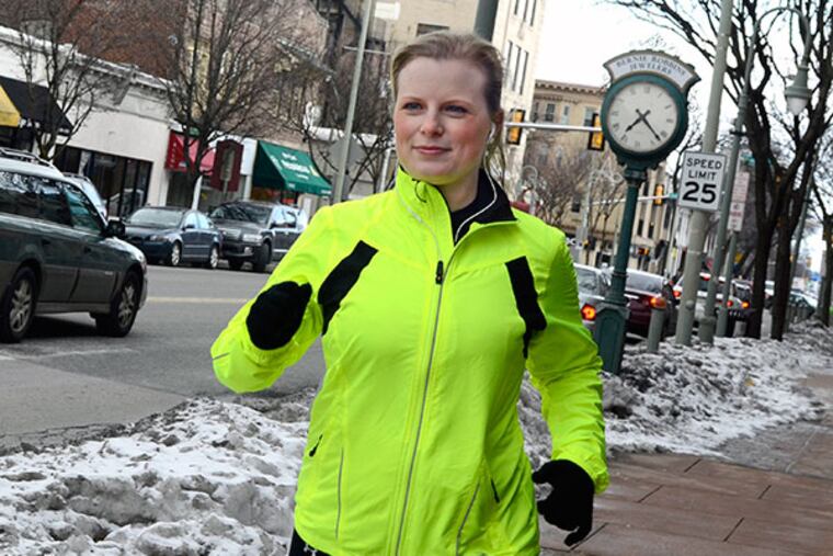 Meredith Minnick runs in Ardmore on February 27, 2014. She is one of hundreds of Broad Street hopefuls trying to get a highly coveted bib. ( TOM GRALISH / Staff Photographer )