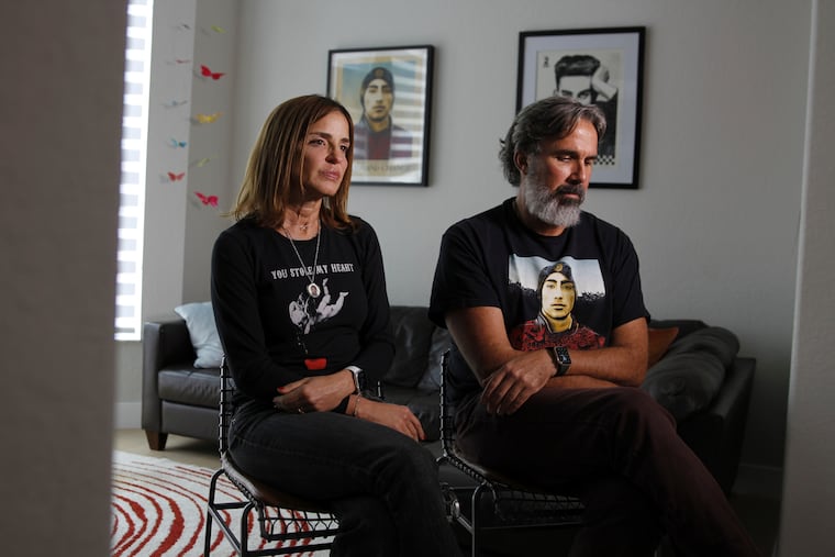 Manuel and Patricia Oliver, the parents of Joaquin Oliver, one of the victims of the 2018 mass shooting at Marjory Stoneman Douglas High School in Parkland, Fla., sit for an interview in Coral Springs, Fla., on Friday.