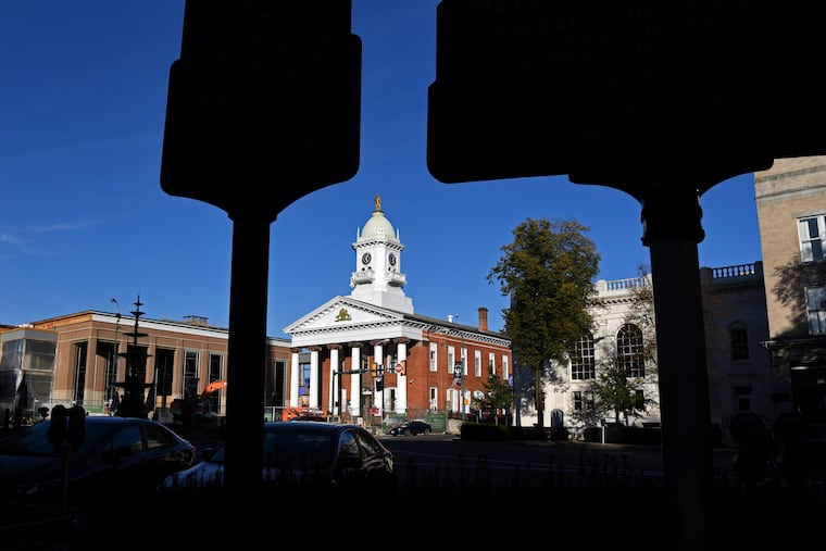 Historical markers across the street from the Franklin County Courthouse in downtown Chambersburg in October. The courthouse was built in 1865, after the previous courthouse was burned down during the 1864 raid by Confederate forces under Brigadier General John A. McCausland.