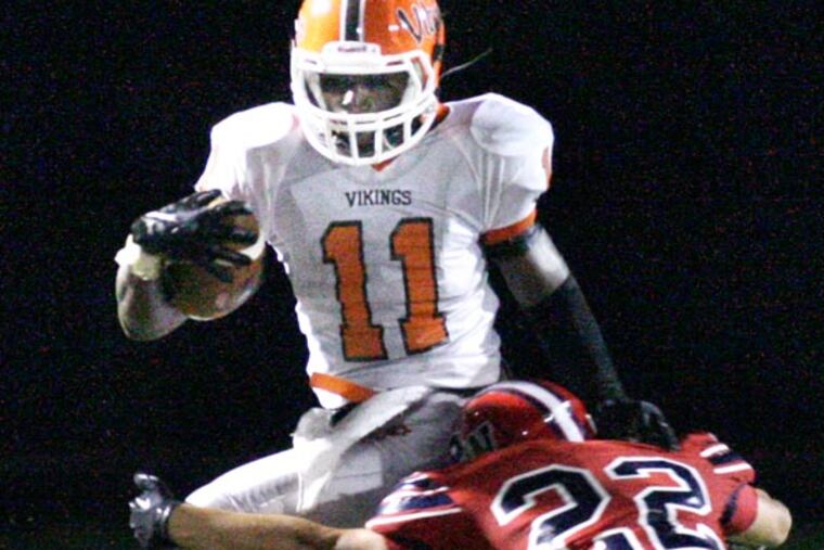 Perkiomen Valley's Rasaan Stewart tries to avoid Plymouth's Jake Winterbottom. (Elizabeth Robertson/Staff Photographer)