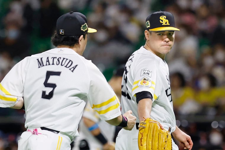 Matt Moore, right, spent last year pitching in Japan.