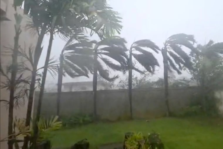 This image provided by Glen Hunter, shows high winds during a super typhoon on Tuesday, April 14, 2026 in the island of Saipan.