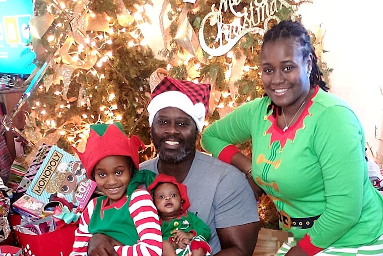 Moussa and Lexi with children Camille, left, and MJ.