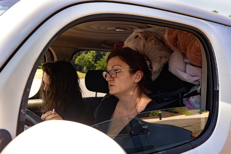 Sabrina Barger-Turner and her older son, Aiden Turner, 13, on June 30 in Abingdon, Md.