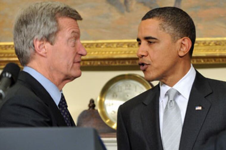 President Barack Obama speaks with U.S. Senator Max Baucus (D-Mass.) during a press conference in Washington, D.C. Obama met with members of the Senate Democratic Caucus to discuss health care reform. (Ron Sachs/Abaca Press/MCT)