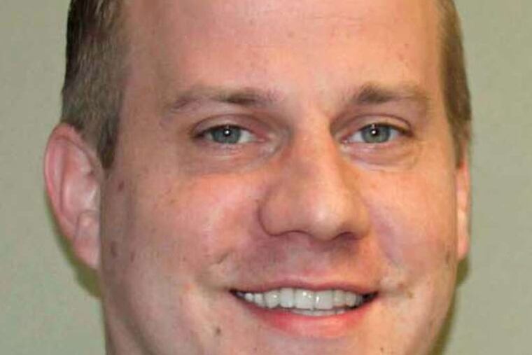 Brian McGinnis won a four-year term as county chairman.