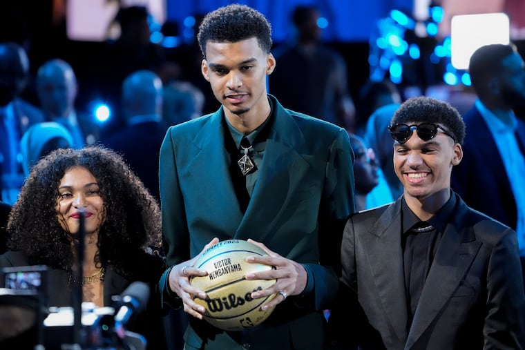 Victor Wembanyama reacts during introductions before the NBA basketball draft, Thursday, June 22, 2023, in New York.