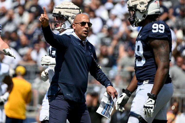 Penn State head coach James Franklin instructs his players during an NCAA college spring football game Saturday, April 23, 2022, in State College, Pa. (AP Photo/Barry Reeger)