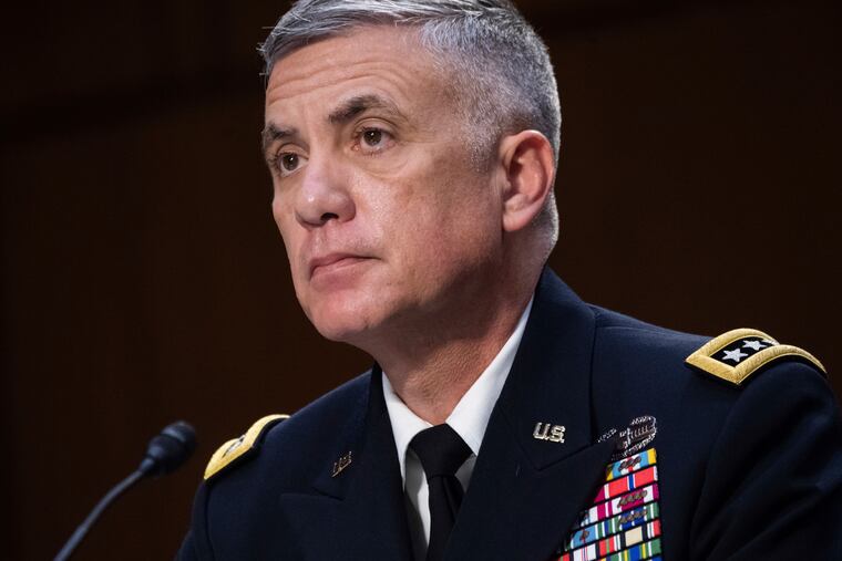 In this April 14, 2021, file photo National Security Agency (NSA) Director Gen. Paul Nakasone testifies during a Senate Select Committee on Intelligence hearing about worldwide threats, on Capitol Hill in Washington. Nakasone who leads U.S. efforts to thwart and punish foreign-based cyberattacks says he’s mounting a new “surge” to fight incursions that have at times debilitated government agencies and companies responsible for critical infrastructure. In an interview, Nakasone broadly described “an intense focus” by government specialists to better find and share information about cyberattacks and “impose costs when necessary.”