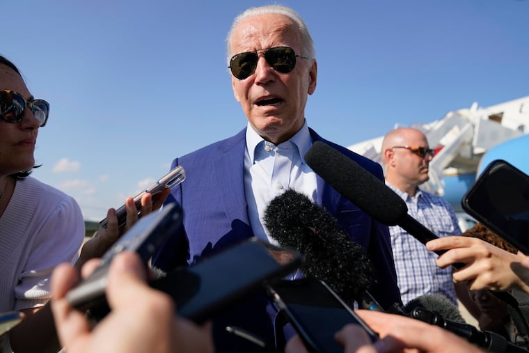 President Joe Biden speaks to members of the media after exiting Air Force One, Wednesday, July 20, 2022, at Andrews Air Force Base, Md. Biden is returning from a trip to Somerset, Mass., where he spoke about climate change.