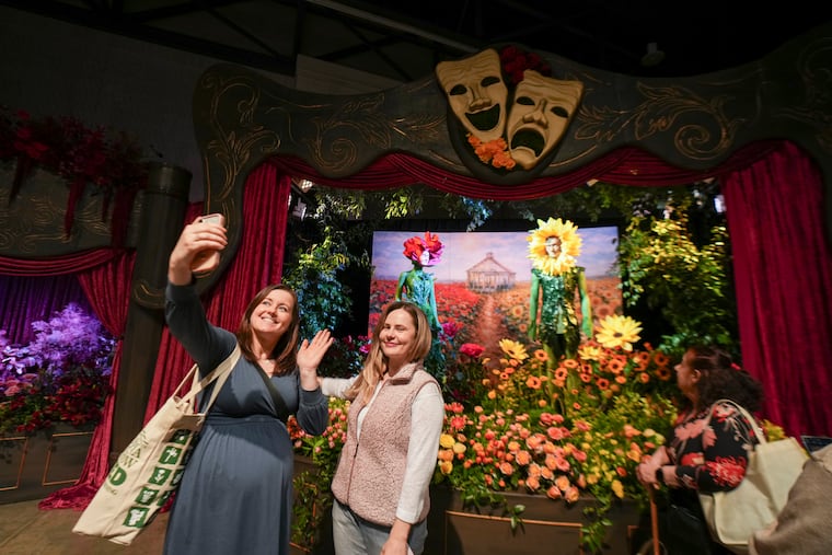 Majlinda Nothacker, left, and Val Garber, right, at the Rooted in Love exhibit, a theatrical floral exhibit that brings together horticulture and Shakespearean storytelling, by Jennifer Designs, Mullica Hill NJ, at the the Philadelphia Flower Show, in Philadelphia, Friday, Feb. 27, 2026.