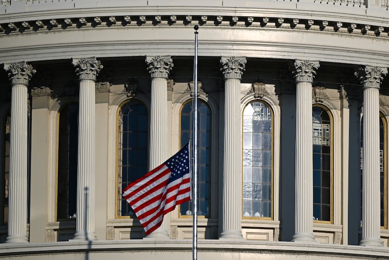 An American flag flies at half-staff outside of the Capitol after the death of Sen. Lindsey Graham (R-S.C.), who died on Saturday, in Washington, on Monday, July 13, 2026. Still shaken from the sudden death of Graham, Senate Republicans returned to Washington on Monday and were immediately forced to confront the policy and political complications caused by his absence.