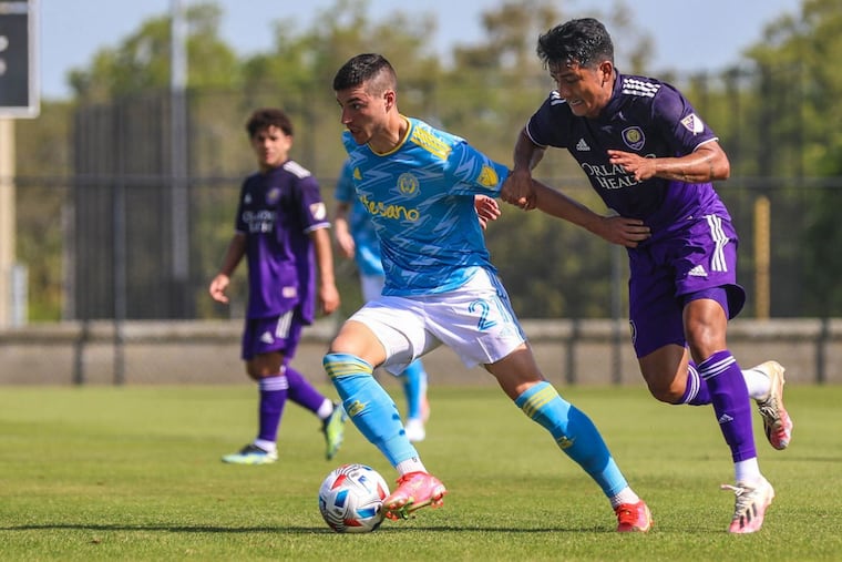 Union midfielder Anthony Fontana, center, on the ball during the team's first preseason scrimmage this year, a 1-0 loss to Orlando City on March 15.