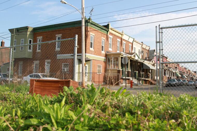 The large vacant lot at 1801 West Courtland St. is shown in the foreground with the homes on Gratz Street in the background on April 25, 2014. (CHARLES FOX/Staff Photographer)